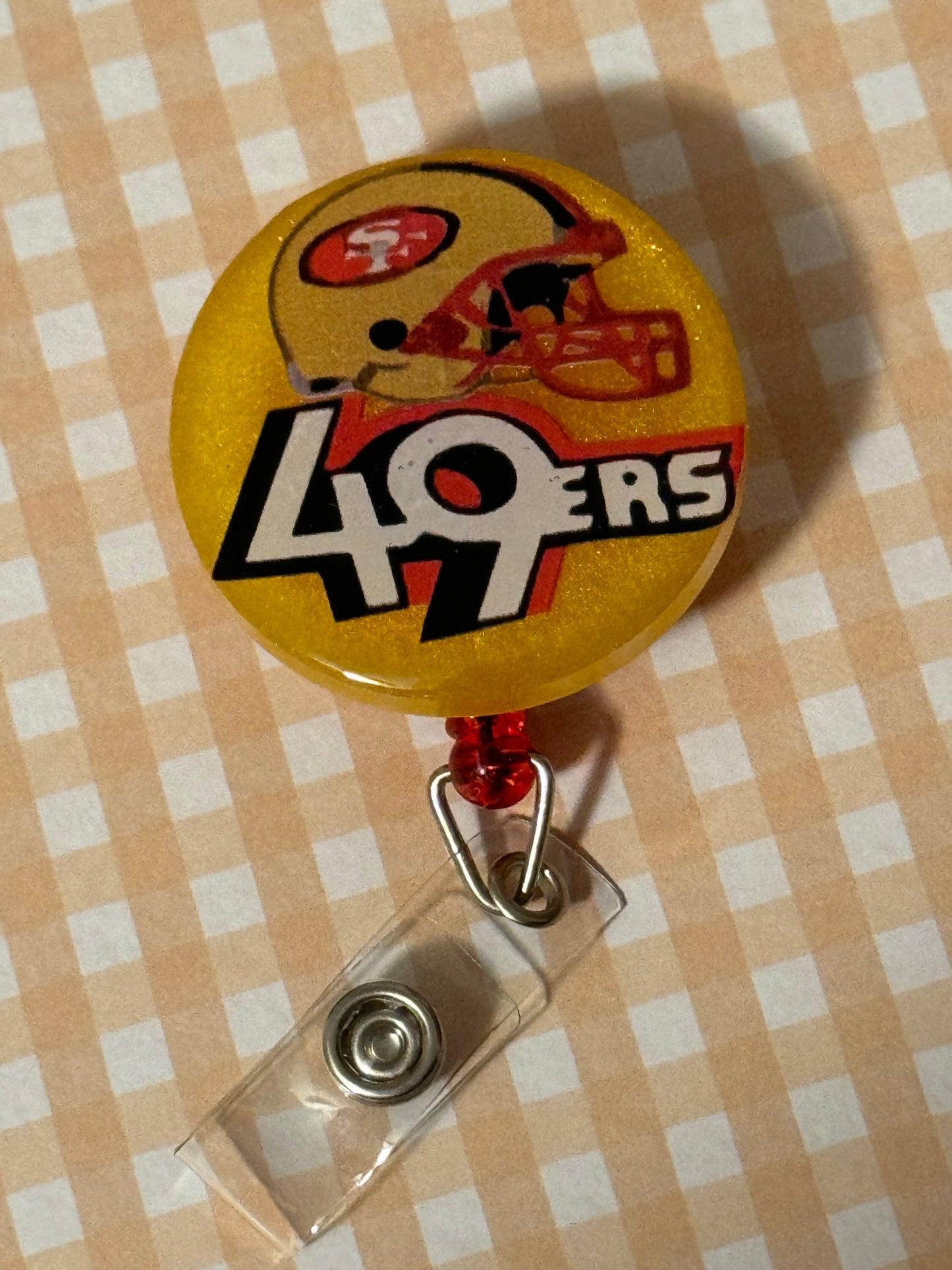 49ers Gold Badge Reel