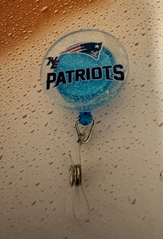 Clear With Blue Patriots Badge Reel