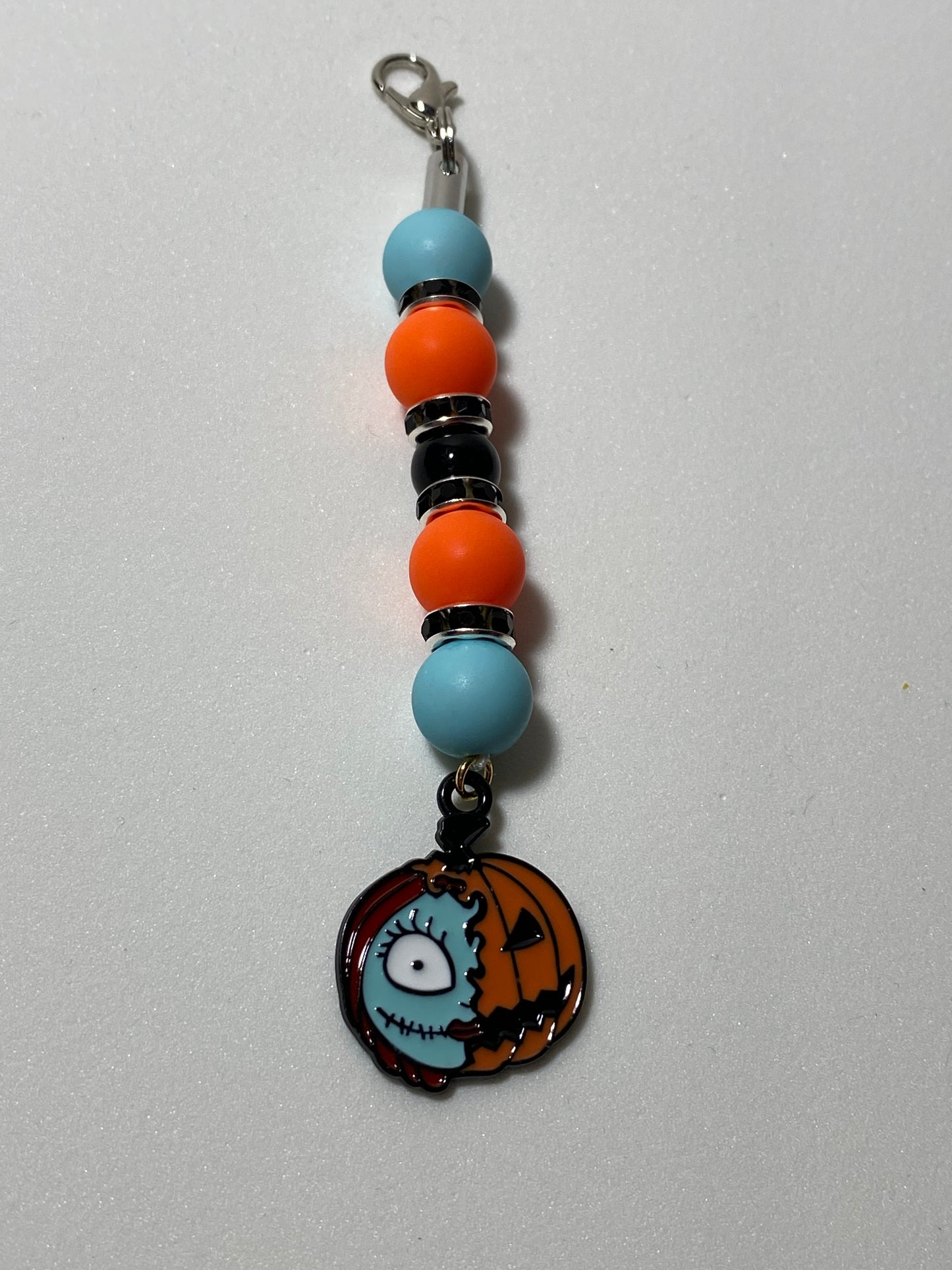 Sally Half Pumpkin Zipper Pull / Keychain Charm