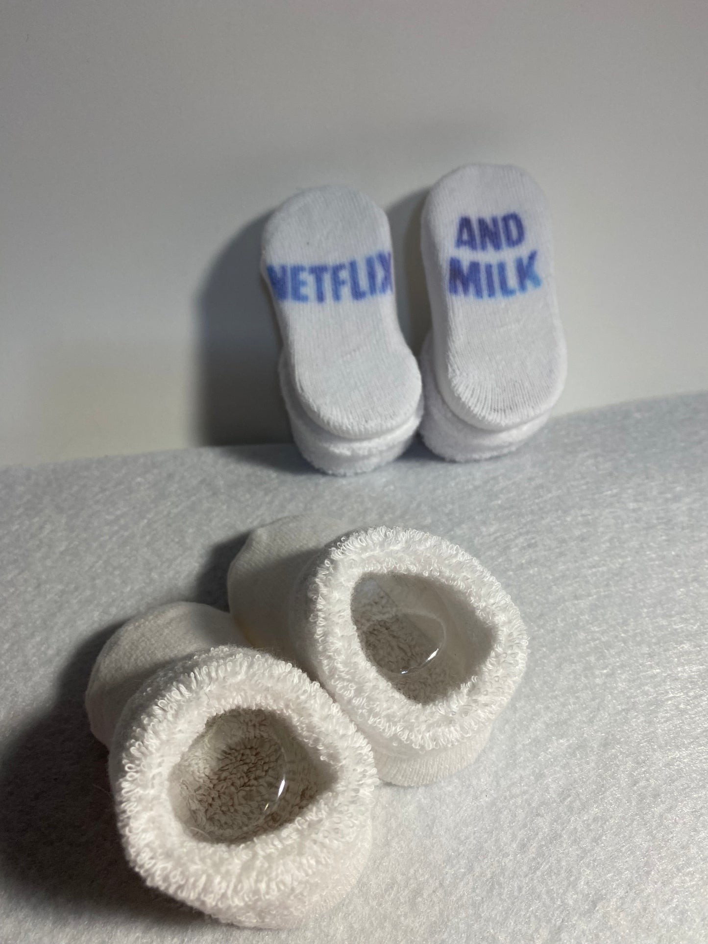 Blue Netflix and Milk Booties